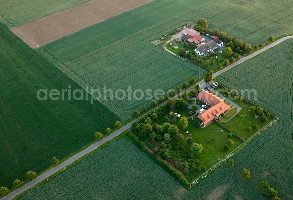 Aerial photograph Vipperow - Agricultural farms on fields on the B198 road at Vipperow in Mecklenburg - West Pomerania