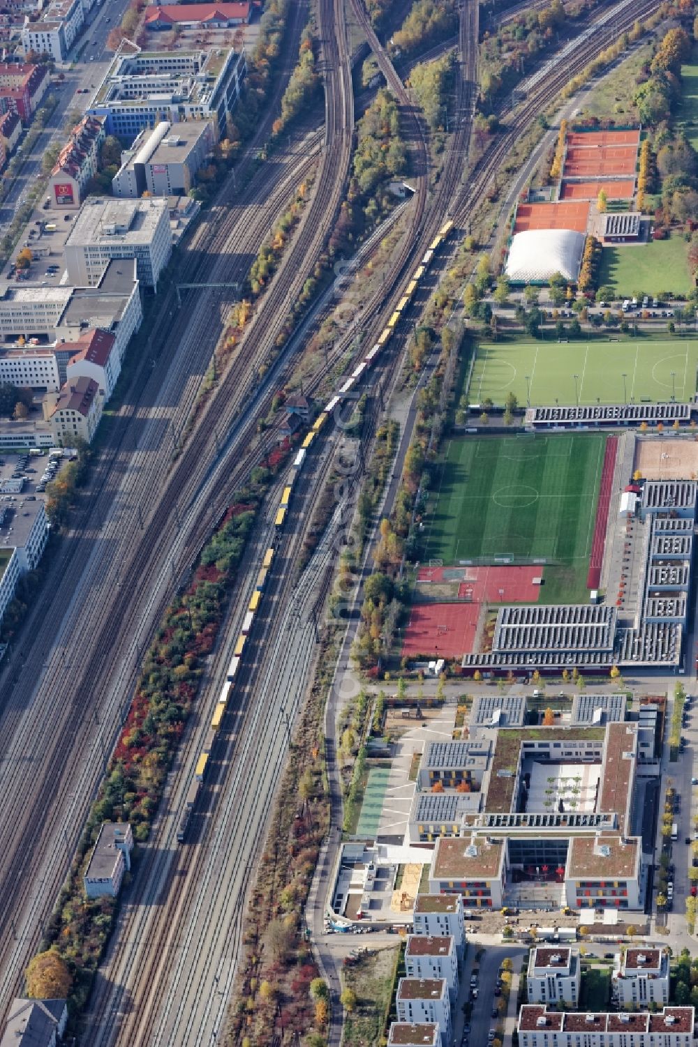 München from the bird's eye view: Freight Train in Munich Laim on the railway tracks parallel to the Landsberger Strasse in the state of Bavaria