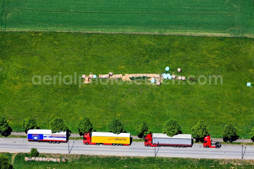 Aerial photograph Landshut - Lorries and semi truck on a country road at the field edge at Landshut in Bavaria