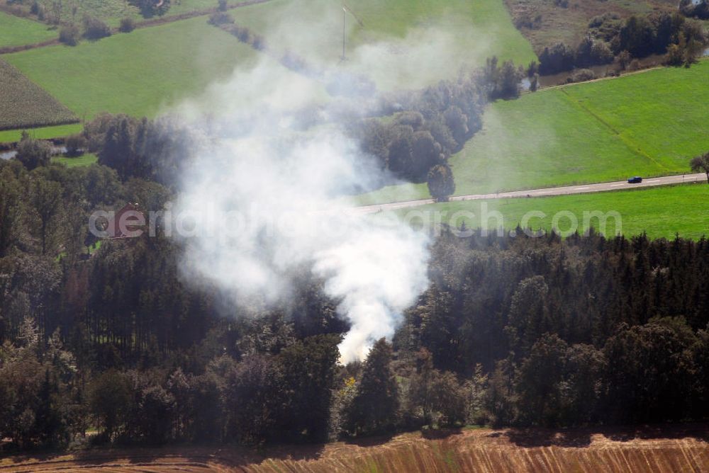 Ebnat from the bird's eye view: Blick auf Laubverbrennung in einem kleinen Waldstück nahe Ebnat.