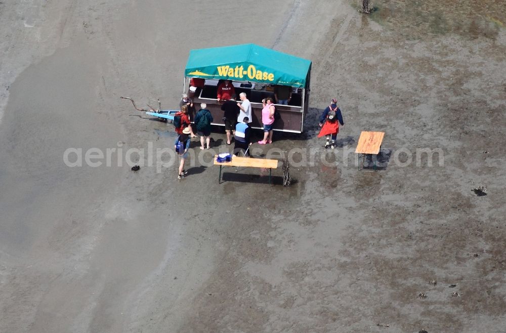 Neuwerk from the bird's eye view: Running, walking, riding and driving carriages at the beach with the Wadden Sea to the North Sea - Coastal landscape along the Neuwerk