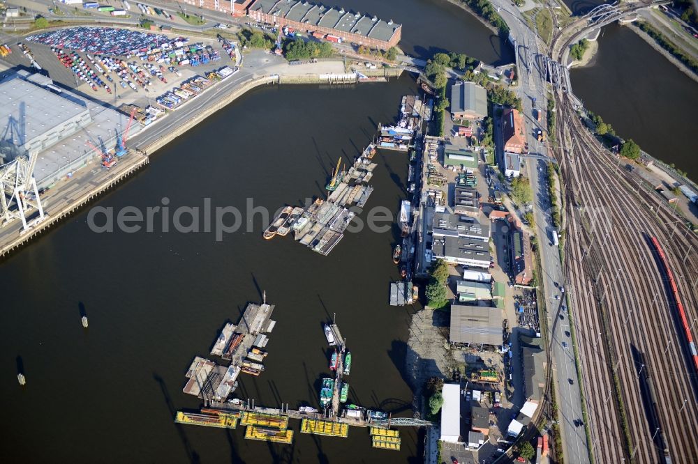 Hamburg from the bird's eye view: Luebeck riverside in Hamburg-Mitte / Kleiner Grasbrook. A project of the Hamburg Port Authority HPA