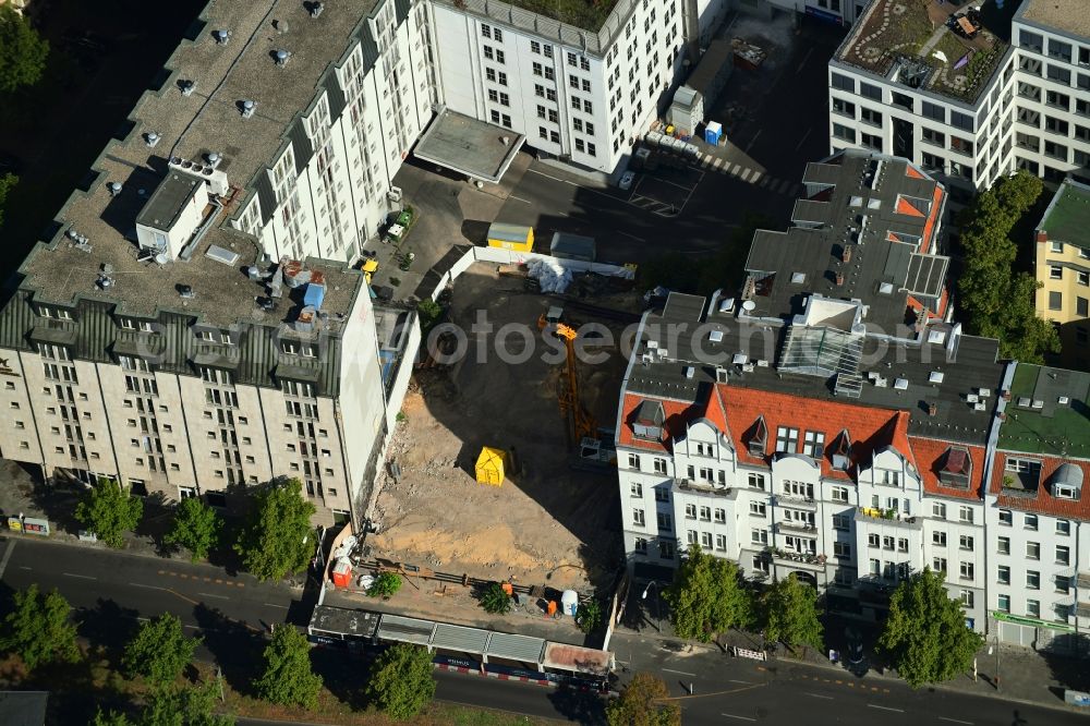 Aerial photograph Berlin - Construction site for the construction of gaps along the multi-family house residential housing estate Fiftysix on Lietzenburger Strasse in the district Charlottenburg in Berlin, Germany