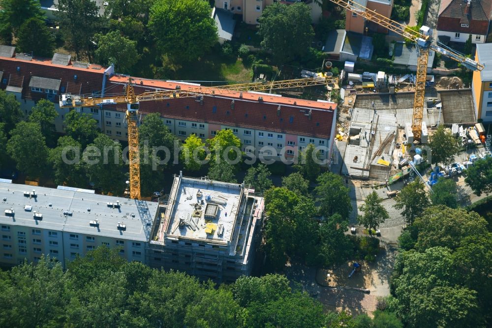 Berlin from the bird's eye view: Construction site for the construction of gaps along the multi-family house residential housing estate Friedlander Strasse in the district Adlershof in Berlin, Germany