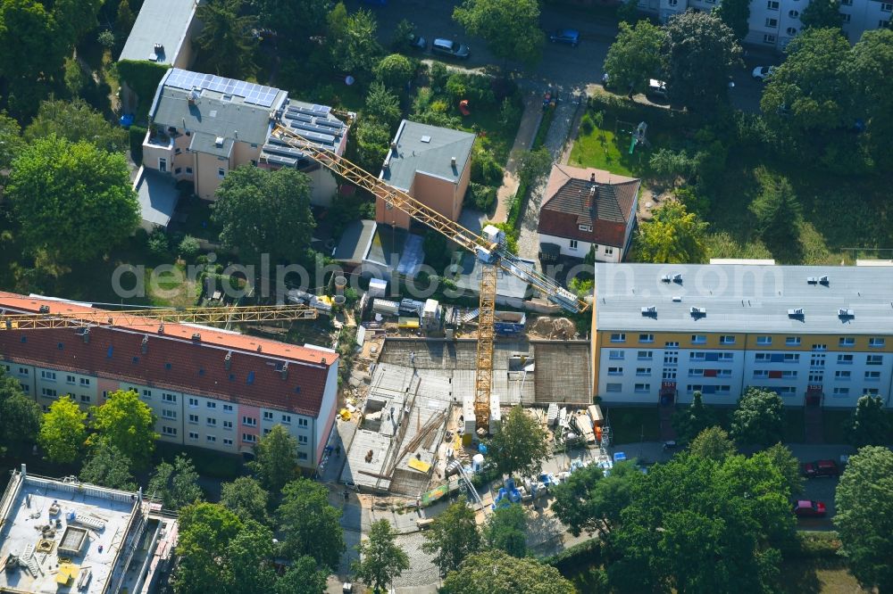 Aerial image Berlin - Construction site for the construction of gaps along the multi-family house residential housing estate Friedlander Strasse in the district Adlershof in Berlin, Germany