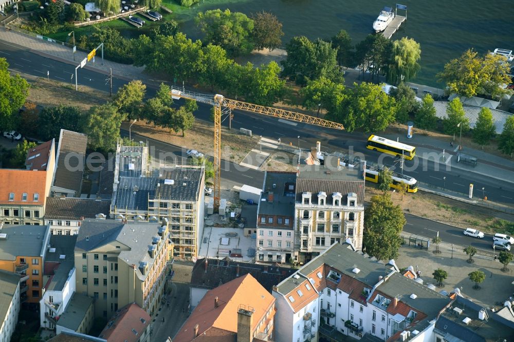 Aerial photograph Berlin - Construction site for the construction of gaps along the multi-family house residential housing estate Mueggelheimer Strasse - Gruenstrasse in the district Koepenick in Berlin, Germany