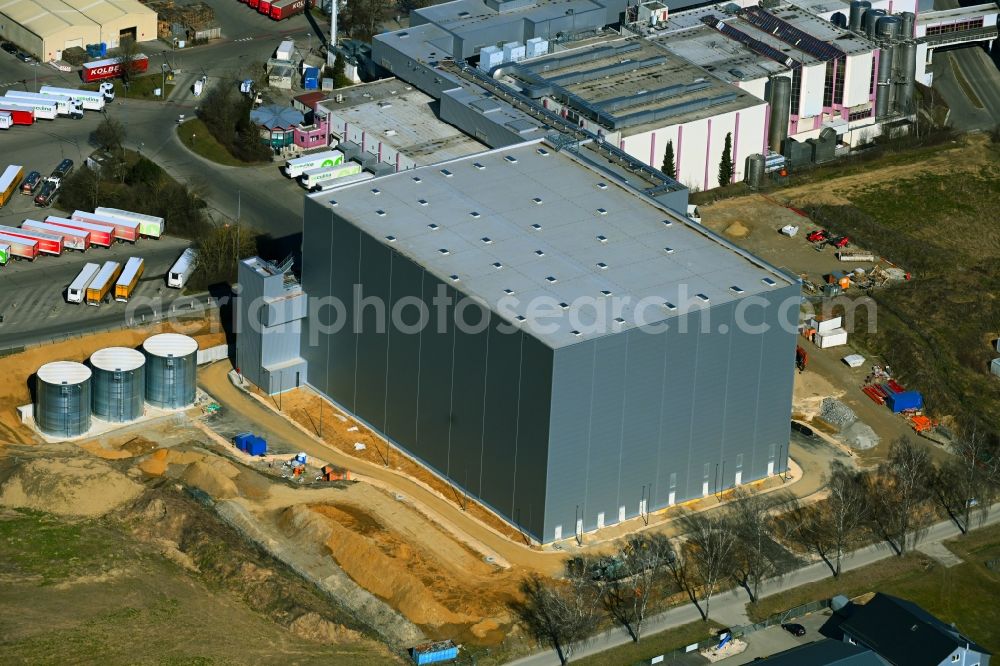 Aretsried from above - Buildings and production halls on the food manufacturer's premises of Molkerei Alois Mueller GmbH & Co. KG on street Zollerstrasse in Aretsried in the state Bavaria, Germany