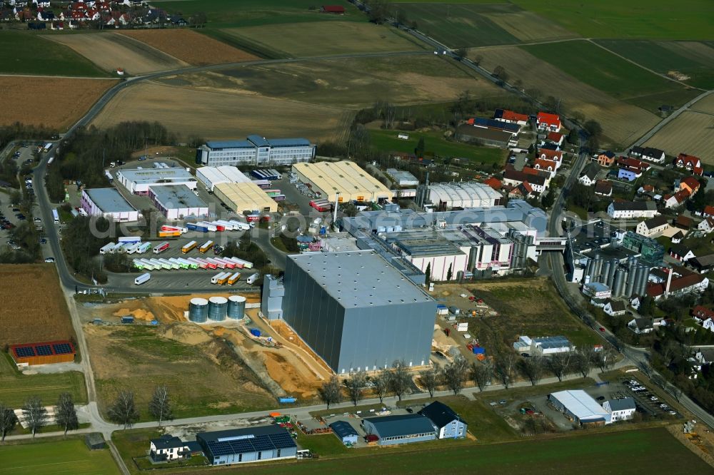 Aretsried from the bird's eye view: Buildings and production halls on the food manufacturer's premises of Molkerei Alois Mueller GmbH & Co. KG on street Zollerstrasse in Aretsried in the state Bavaria, Germany