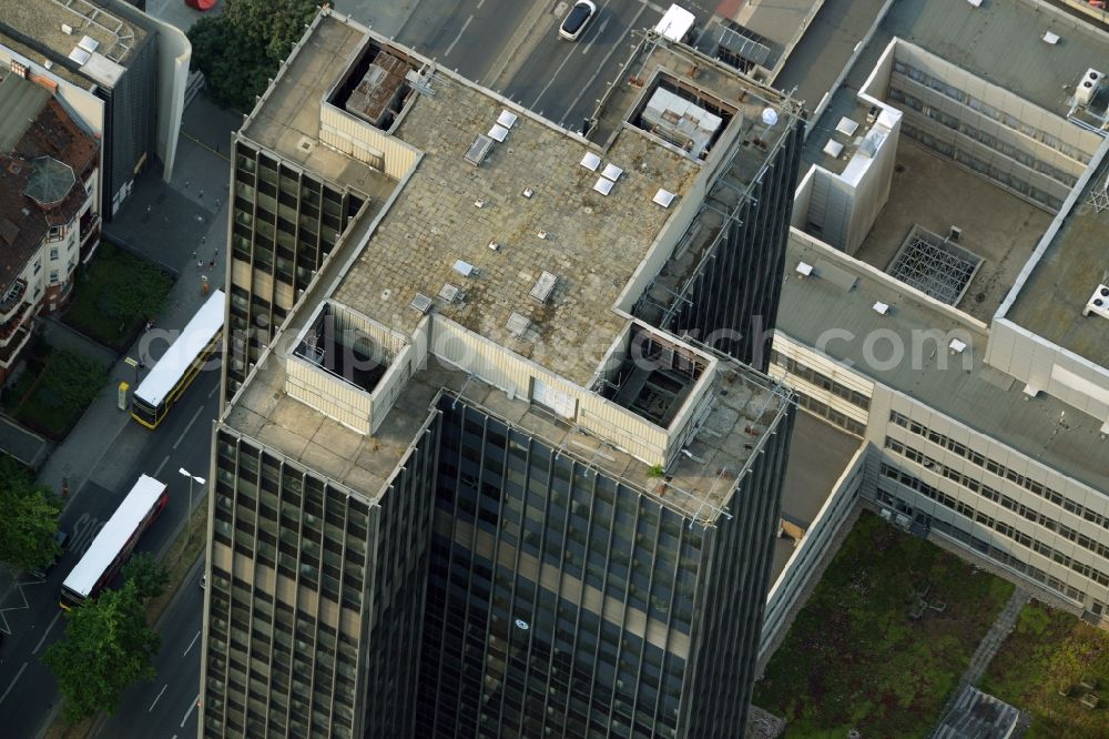 Berlin from above - View of the Steglitzer Kreisel, a building complex with an office tower in Berlins district of Steglitz