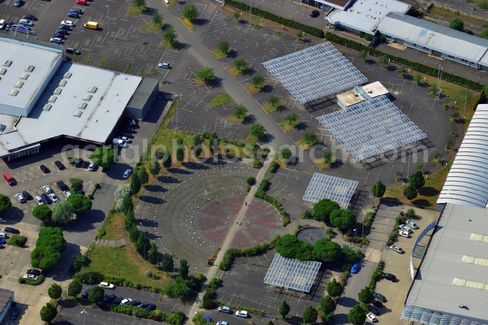 Aerial photograph Hoppegarten - The Carena car park Hoppegarten in the state of Brandenburg is one of the biggest used car markets in the region. On the grounds cars are bought, processed and resold. Services include car financing and a repair shop