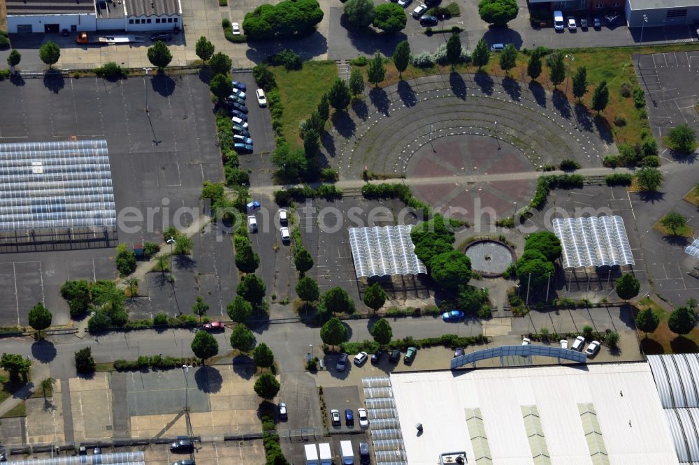 Aerial image Hoppegarten - The Carena car park Hoppegarten in the state of Brandenburg is one of the biggest used car markets in the region. On the grounds cars are bought, processed and resold. Services include car financing and a repair shop