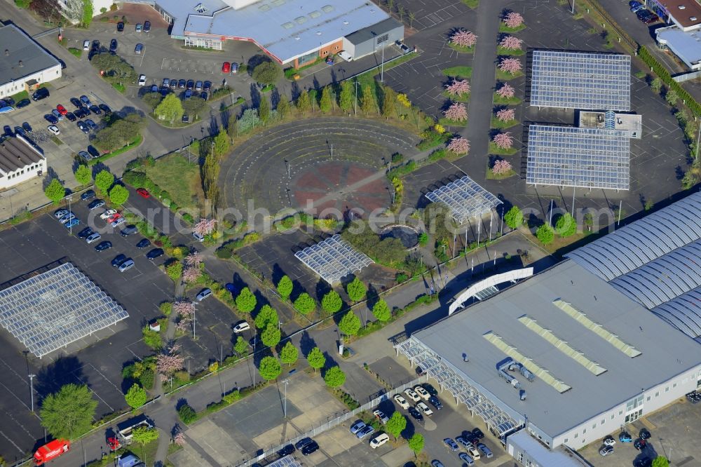 Aerial image Hoppegarten - The Carena car park Hoppegarten in the state of Brandenburg is one of the biggest used car markets in the region. On the grounds cars are bought, processed and resold. Services include car financing and a repair shop