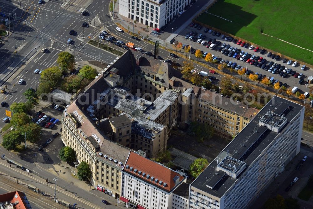 Leipzig from the bird's eye view: View of the empty building of the former Hotel Astoria at Willy- Brandt- Platz in Leipzig in Saxony. The luxurious building between Kurt Schumacher Strasse and Gerberstrasse was one of the most notable hotels in the German Democratic Republic ( GDR ), but has been vacant since its closure in 1997 and is threatened by decay. Owner of a listed building complex is the U.S. investment firm Blackstone Group