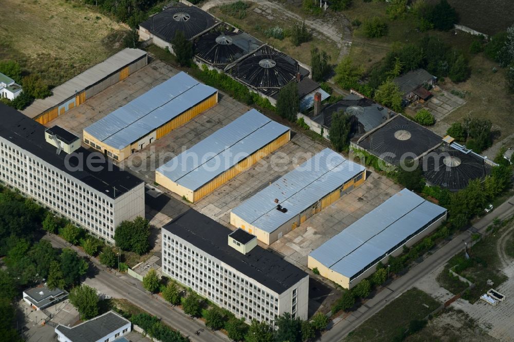 Aerial image Berlin - Vacant, unused building of Garagenkomplexe on Koepenicker Allee corner Am Alten Flugplatz in the district Karlshorst in Berlin, Germany