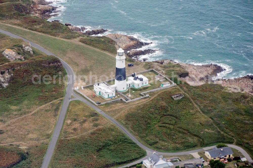 Aerial photograph Aldernay - Lighthouse as a historic seafaring character in the coastal area of Alderney, Guernsey