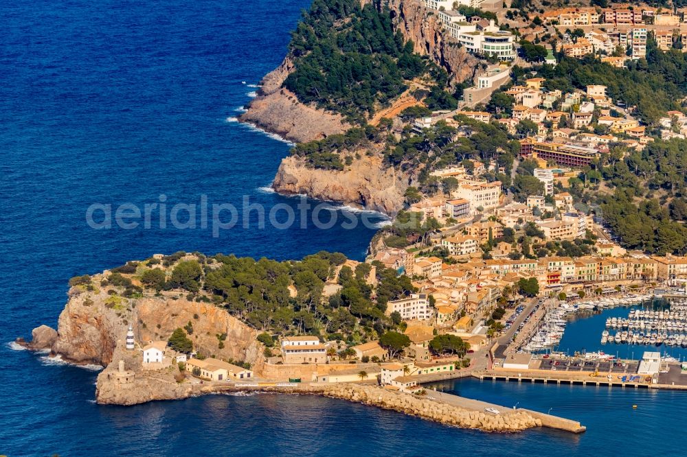 Soller from the bird's eye view: Lighthouse as a historic seafaring character in the coastal area Balearic Sea in Soller in Balearic Islands, Spain