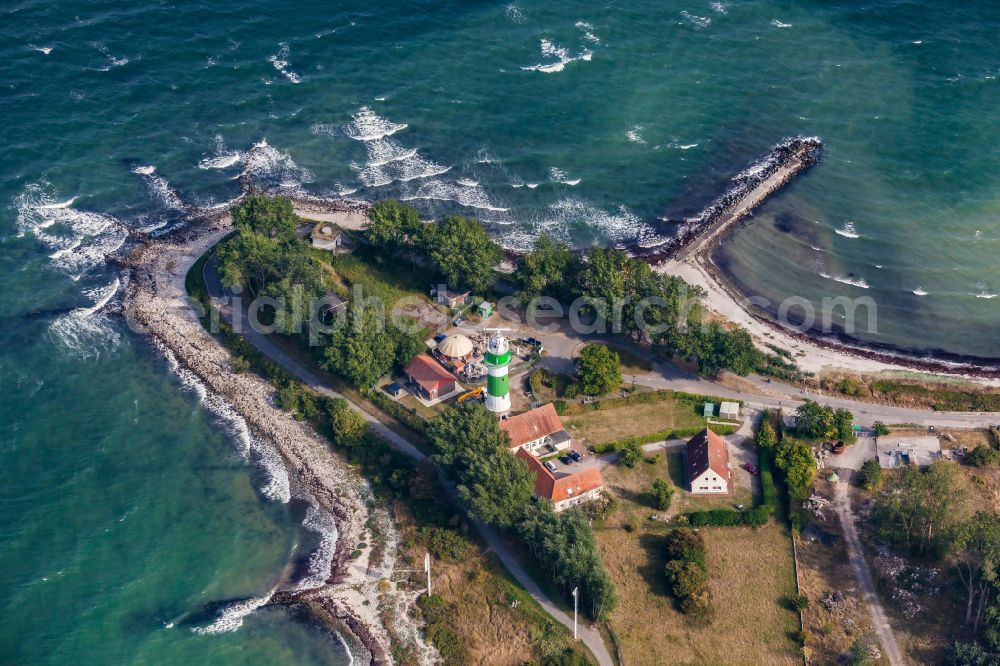 Strande from the bird's eye view: Lighthouse as a historic seafaring character in the coastal area Buelk on street Buelker Weg in Strande in the state Schleswig-Holstein, Germany