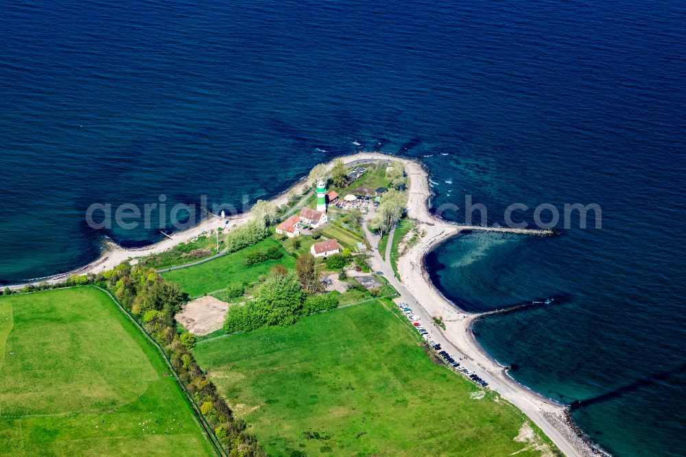 Strande from the bird's eye view: Lighthouse as a historic seafaring character in the coastal area Buelk on street Buelker Weg in Strande in the state Schleswig-Holstein, Germany