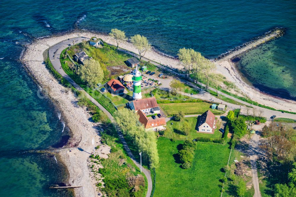 Strande from above - Lighthouse as a historic seafaring character in the coastal area Buelk on street Buelker Weg in Strande in the state Schleswig-Holstein, Germany