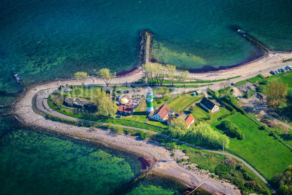 Strande from the bird's eye view: Lighthouse as a historic seafaring character in the coastal area Buelk on street Buelker Weg in Strande in the state Schleswig-Holstein, Germany