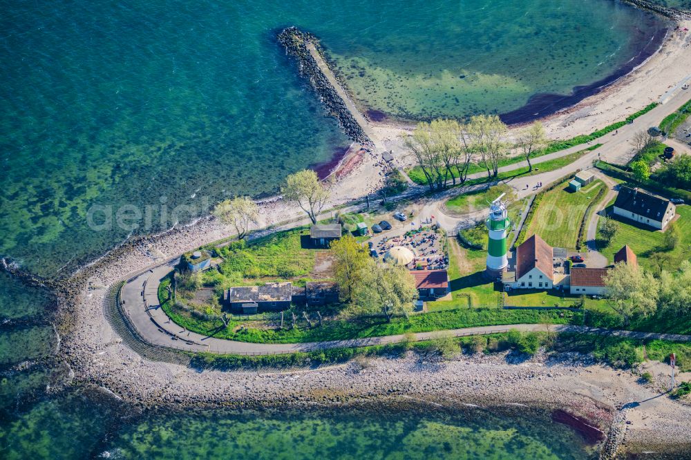 Aerial photograph Strande - Lighthouse as a historic seafaring character in the coastal area Buelk on street Buelker Weg in Strande in the state Schleswig-Holstein, Germany