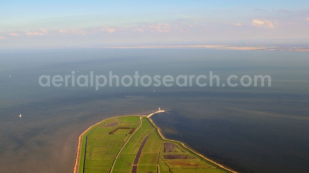 Marken from above - Lighthouse as a historic seafaring character in the coastal area of peninsula in the Markermeer Marken in Nordholland, Niederlande