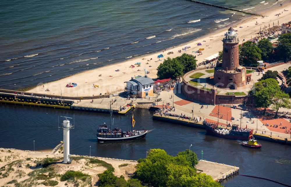 Kolobrzeg - Kolberg from the bird's eye view: Lighthouse as a historic seafaring character in the coastal area of Latarina Morska in Kolberg in West Pomerania, Poland