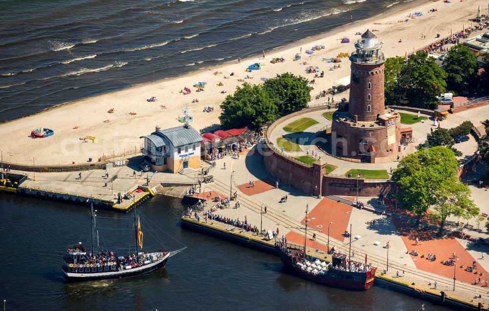 Aerial photograph Kolobrzeg - Kolberg - Lighthouse as a historic seafaring character in the coastal area of Latarina Morska in Kolberg in West Pomerania, Poland