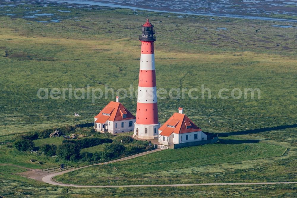 Aerial image Westerhever - Lighthouse as a historic seafaring character in the coastal area of North Sea in the district Hauert in Westerhever in the state Schleswig-Holstein