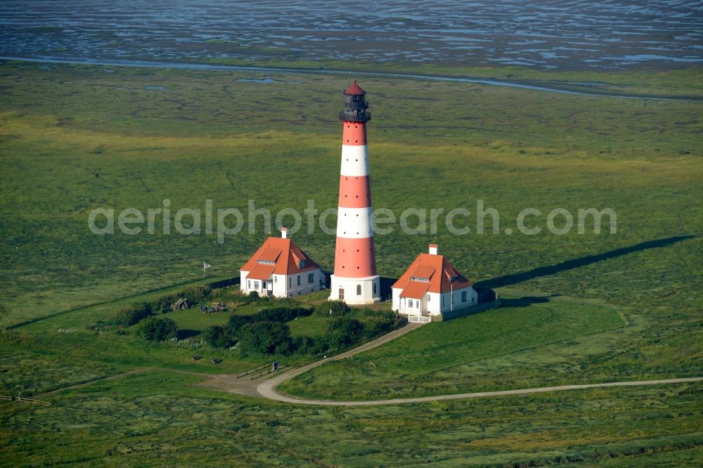 Aerial photograph Westerhever - Lighthouse as a historic seafaring character in the coastal area of North Sea in the district Hauert in Westerhever in the state Schleswig-Holstein