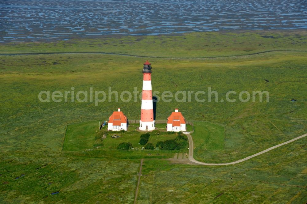 Aerial image Westerhever - Lighthouse as a historic seafaring character in the coastal area of North Sea in the district Hauert in Westerhever in the state Schleswig-Holstein