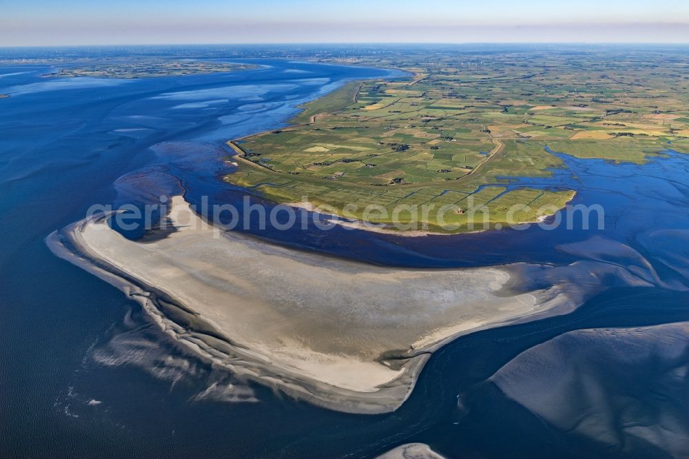 Westerhever from the bird's eye view: Lighthouse as a historic seafaring character in the coastal area of North Sea in the district Hauert in Westerhever in the state Schleswig-Holstein