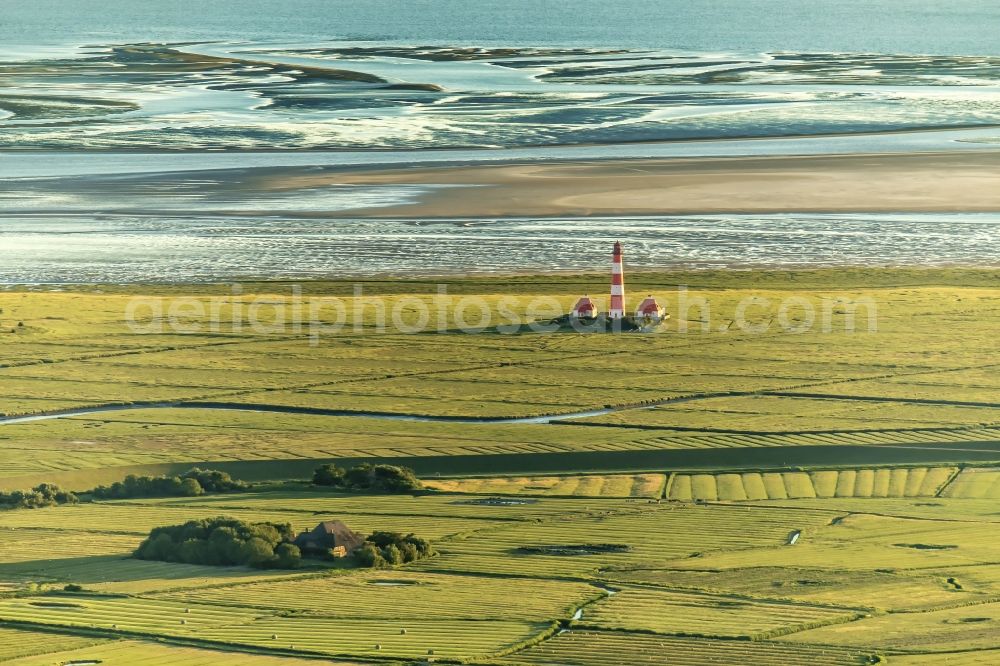 Aerial image Westerhever - Lighthouse as a historic seafaring character in the coastal area of North Sea in the district Hauert in Westerhever in the state Schleswig-Holstein