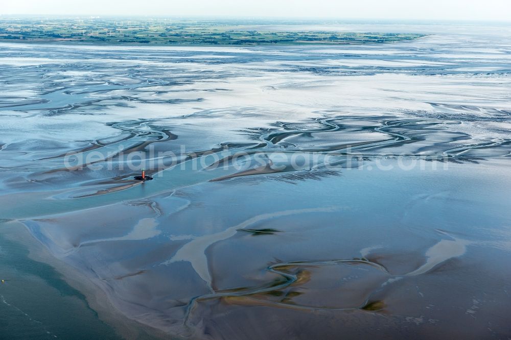 Aerial photograph Butjadingen - Lighthouse as a historic seafaring character in the coastal area of North Sea in the district Langwarden in Butjadingen in the state Lower Saxony