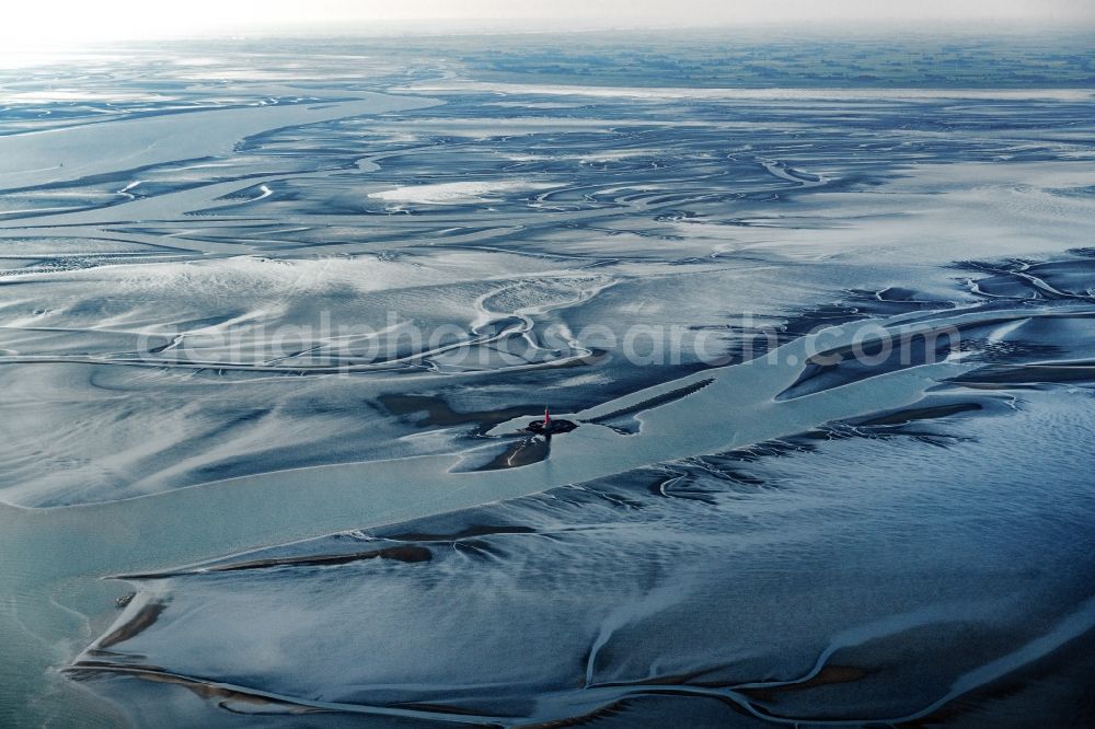 Aerial photograph Butjadingen - Lighthouse as a historic seafaring character in the coastal area of North Sea in the district Langwarden in Butjadingen in the state Lower Saxony