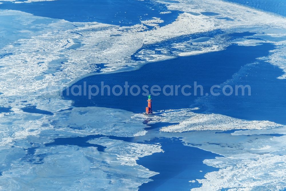 Aerial image Butjadingen - Lighthouse Hohe Weg as a historical maritime sign in the coastal area of a??a??the North Sea in pack ice, in the district Langwarden in Butjadingen in the state of Lower Saxony