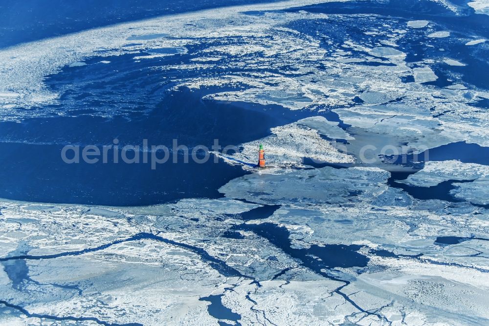 Aerial photograph Butjadingen - Lighthouse Hohe Weg as a historical maritime sign in the coastal area of a??a??the North Sea in pack ice, in the district Langwarden in Butjadingen in the state of Lower Saxony