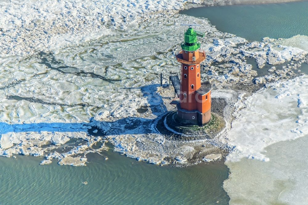 Butjadingen from above - Lighthouse Hohe Weg as a historical maritime sign in the coastal area of a??a??the North Sea in pack ice, in the district Langwarden in Butjadingen in the state of Lower Saxony