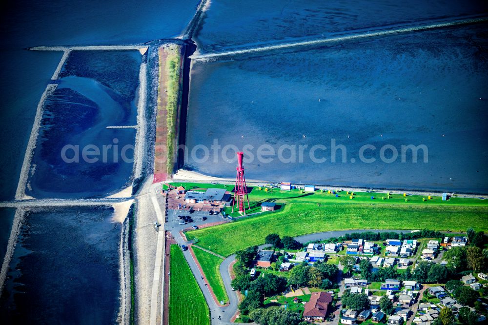 Aerial image Butjadingen - Lighthouse as a historic seafaring character in the coastal area Oberfeuer Leuchtturm Preusseneck on street Eckwarder Strasse in Butjadingen in the state Lower Saxony, Germany