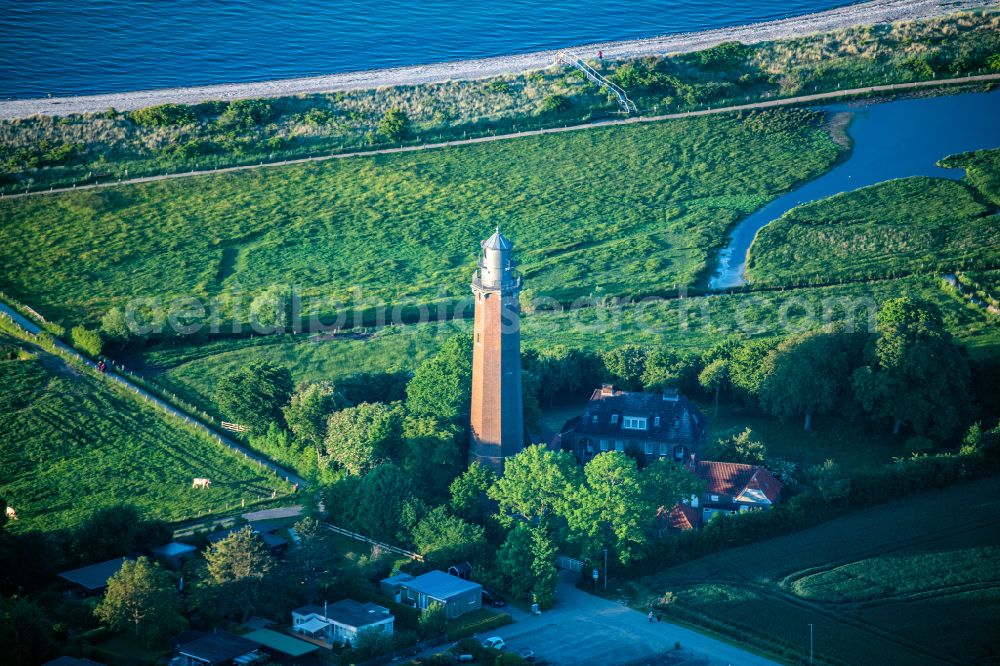 Behrensdorf from above - Lighthouse as a historic seafaring character in the coastal area of Baltic Sea in Behrensdorf at the baltic sea coast in the state Schleswig-Holstein, Germany