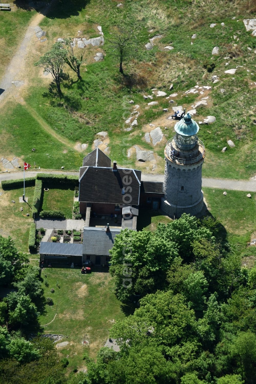 Aerial image Allinge - Lighthouse as a historic seafaring character in the coastal area of Baltic Sea on Bornholm Island in Allinge in Region Hovedstaden, Denmark