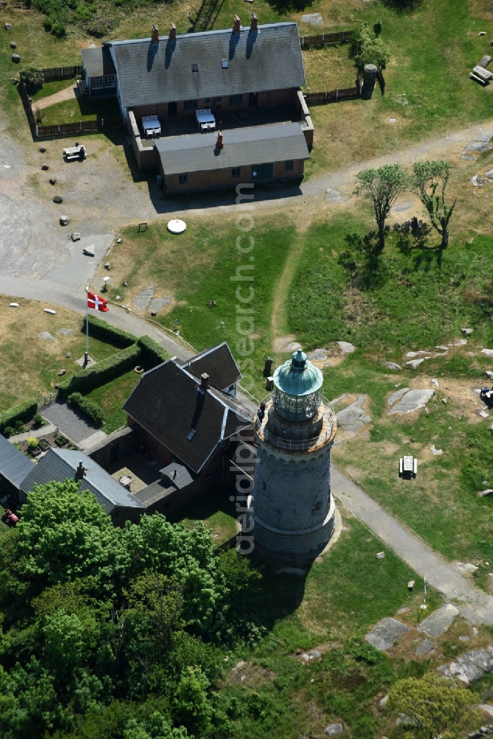 Aerial photograph Allinge - Lighthouse as a historic seafaring character in the coastal area of Baltic Sea on Bornholm Island in Allinge in Region Hovedstaden, Denmark