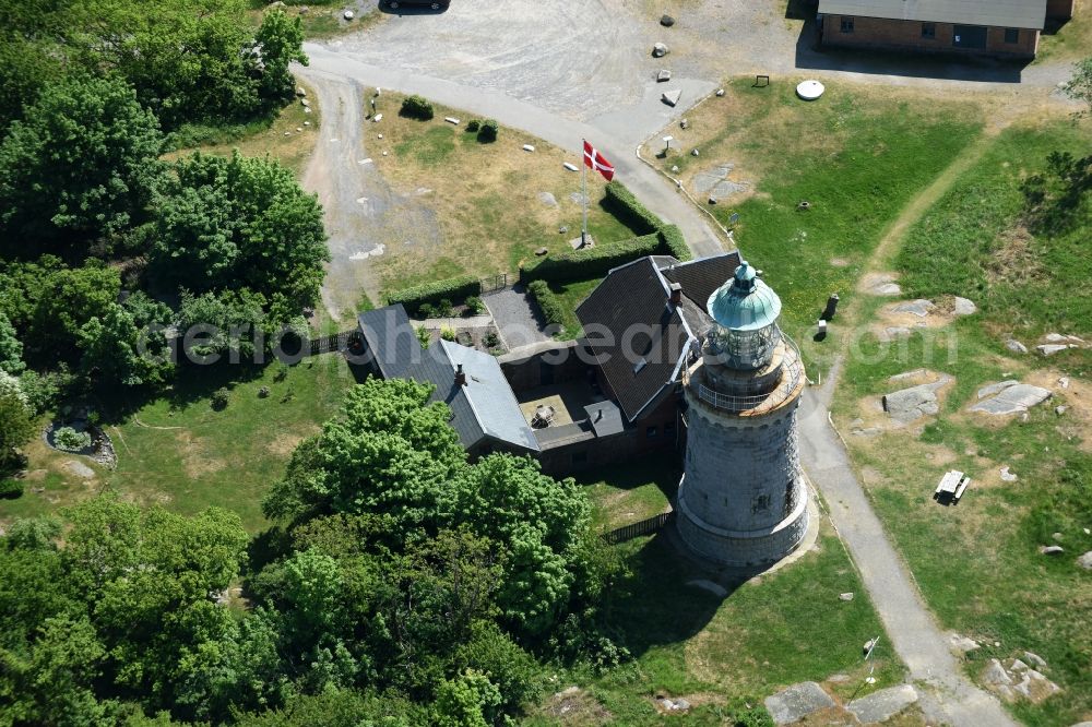 Allinge from the bird's eye view: Lighthouse as a historic seafaring character in the coastal area of Baltic Sea on Bornholm Island in Allinge in Region Hovedstaden, Denmark