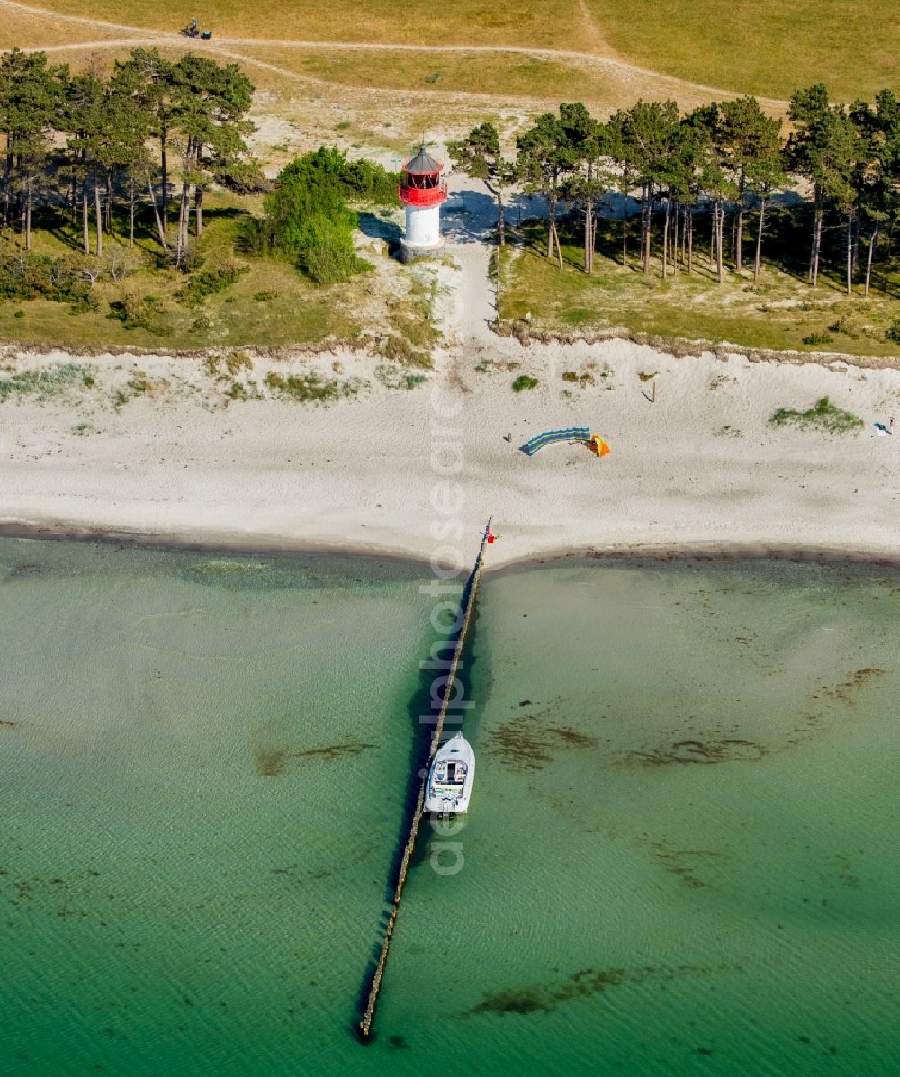 Insel Hiddensee from the bird's eye view: Lighthouse as a historic seafaring character in the coastal area of Plogshagen in Insel Hiddensee in the state Mecklenburg - Western Pomerania