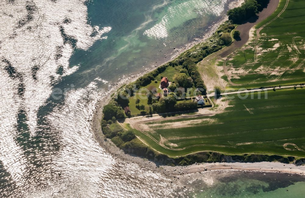 Fehmarn from the bird's eye view: Lighthouse as a historic seafaring sign in the Staberhuk coastal area in the south-east of the island of Fehmarn in Fehmarn in the state Schleswig-Holstein, Germany