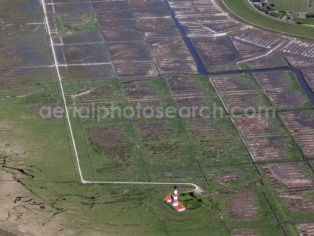 Aerial photograph Westerhever - Lighthouse as a historical navigation sign in the coastal area Westerheversand in the district of Hauert in Westerhever in the federal state Schleswig-Holstein