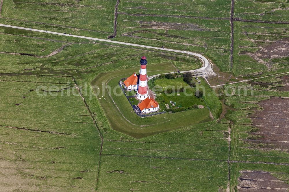 Westerhever from above - Lighthouse as a historical navigation sign in the coastal area Westerheversand in the district of Hauert in Westerhever in the federal state Schleswig-Holstein