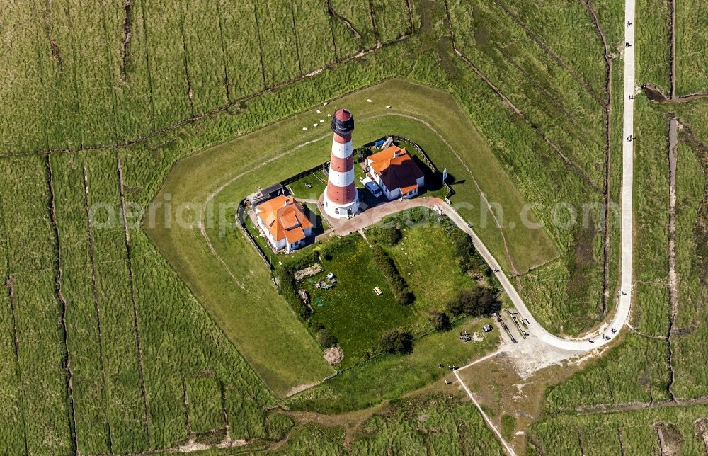 Westerhever from above - Lighthouse as a historical navigation sign in the coastal area Westerheversand in the district of Hauert in Westerhever in the federal state Schleswig-Holstein