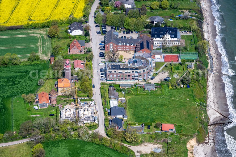 Dahmeshöved from the bird's eye view: Lighthouse as a historic seafaring character Leuchtturm Dahmeshoeved in Dahmeshoeved in the state Schleswig-Holstein, Germany