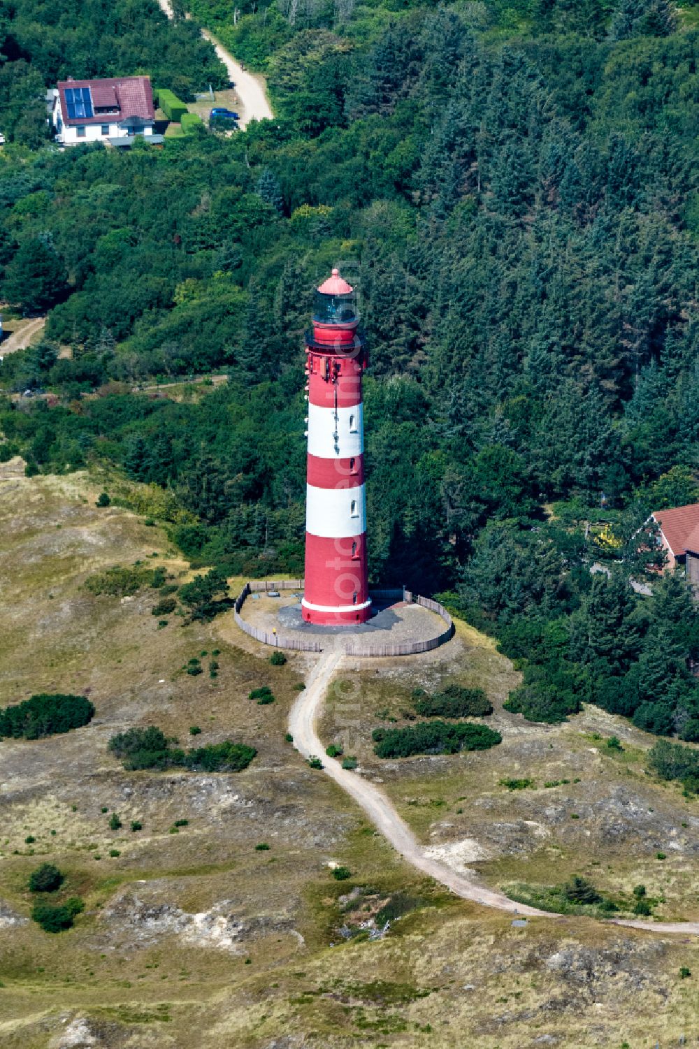 Aerial photograph Nebel - Lighthouse as a historic seafaring character Amrum in Nebel auf Amrum in the state Schleswig-Holstein, Germany